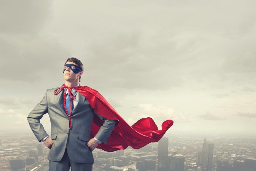 An office employee wearing a red coat and mask with a city skyline background